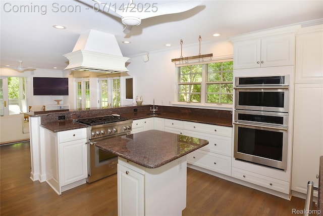 32965 Franklin Ct, Franklin, MI 48025 - kitchen featuring appliances with stainless steel finishes, custom range hood, ceiling fan, plenty of natural light, and recessed lighting