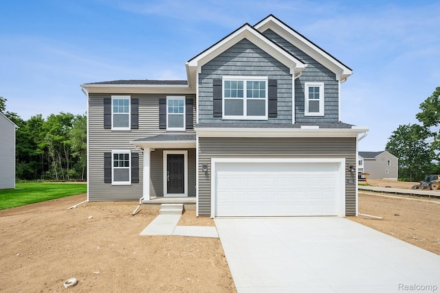 4311 Oak St, Grand Blanc, MI 48439 - view of front of property featuring an attached garage and driveway