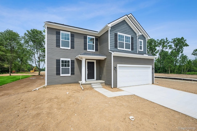 4311 Oak St, Grand Blanc, MI 48439 - view of front of home with an attached garage and driveway