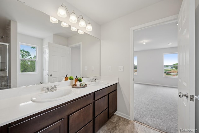 4311 Oak St, Grand Blanc, MI 48439 - full bathroom featuring double vanity and a shower with door