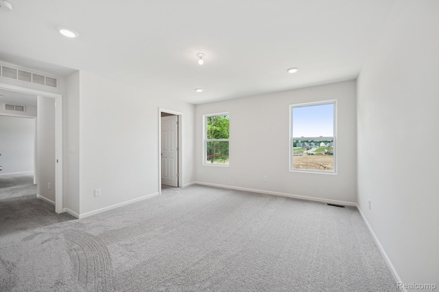 4311 Oak St, Grand Blanc, MI 48439 - unfurnished bedroom featuring carpet flooring and recessed lighting
