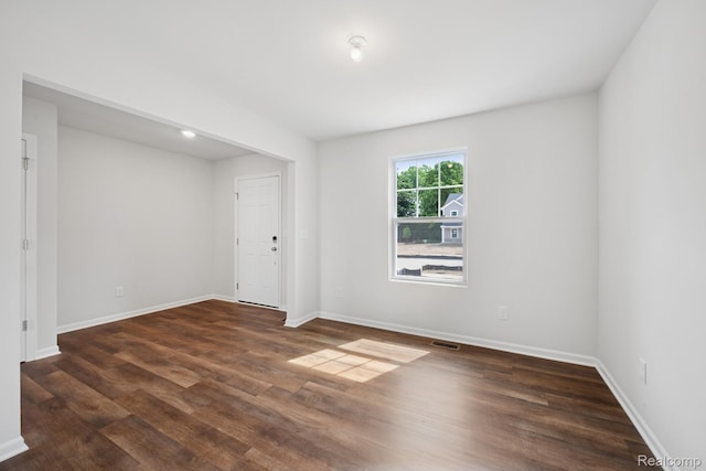 4311 Oak St, Grand Blanc, MI 48439 - empty room with wood finished floors and baseboards