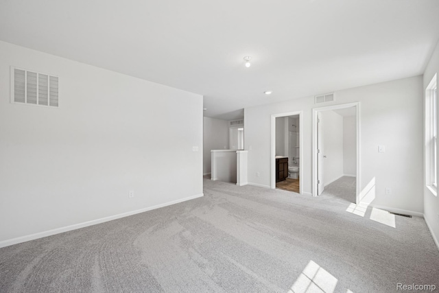 4311 Oak St, Grand Blanc, MI 48439 - carpeted empty room featuring baseboards
