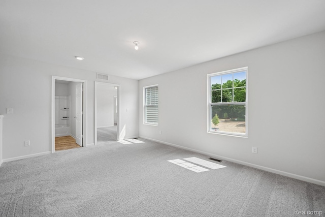 4311 Oak St, Grand Blanc, MI 48439 - unfurnished bedroom featuring carpet flooring and connected bathroom