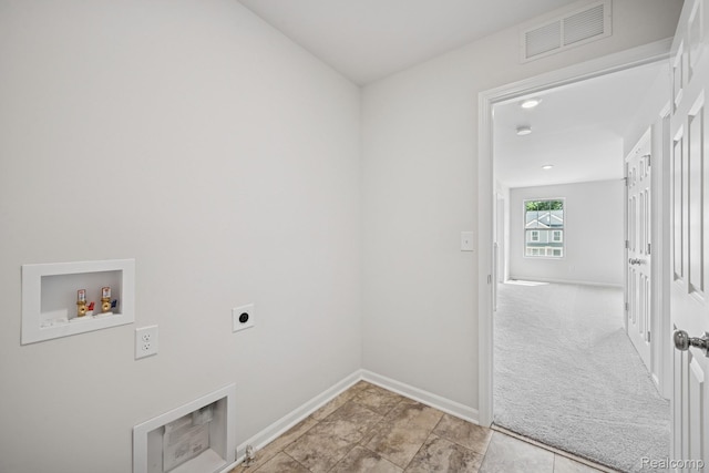 4311 Oak St, Grand Blanc, MI 48439 - laundry area featuring hookup for a washing machine, electric dryer hookup, and light colored carpet
