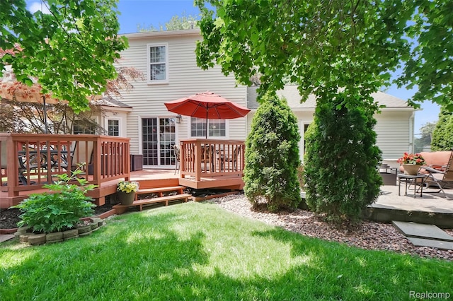54286 Bradshaw Dr, New Baltimore, MI 48047 - rear view of property with a lawn and a deck