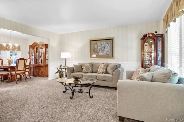 54286 Bradshaw Dr, New Baltimore, MI 48047 - living room featuring a chandelier, wallpapered walls, and carpet flooring