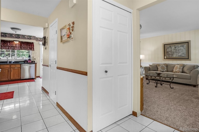54286 Bradshaw Dr, New Baltimore, MI 48047 - hallway with light tile patterned floors and light carpet