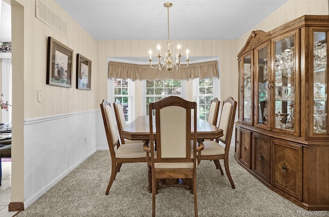 54286 Bradshaw Dr, New Baltimore, MI 48047 - dining area with a chandelier and light colored carpet