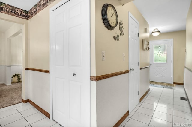 54286 Bradshaw Dr, New Baltimore, MI 48047 - hallway with light tile patterned flooring and baseboards