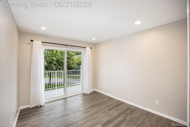 56217 Troon N, Utica, MI 48316 - spare room with dark wood-style flooring and recessed lighting