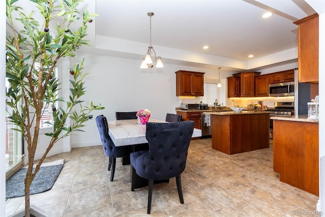 52854 Schafers Run Ct, New Baltimore, MI 48051 - dining area with a tray ceiling and recessed lighting