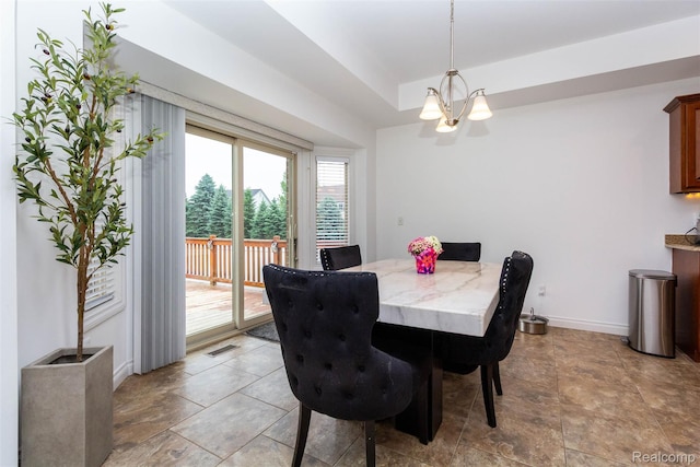 52854 Schafers Run Ct, New Baltimore, MI 48051 - dining room with a chandelier and baseboards