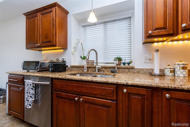 52854 Schafers Run Ct, New Baltimore, MI 48051 - kitchen with stainless steel dishwasher, light stone countertops, and hanging light fixtures