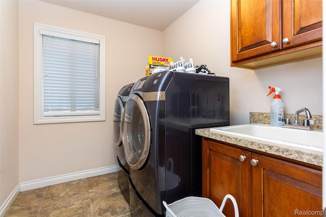 52854 Schafers Run Ct, New Baltimore, MI 48051 - laundry area featuring independent washer and dryer and cabinet space
