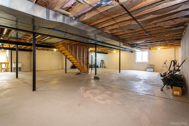 52854 Schafers Run Ct, New Baltimore, MI 48051 - basement featuring stairway and a sink