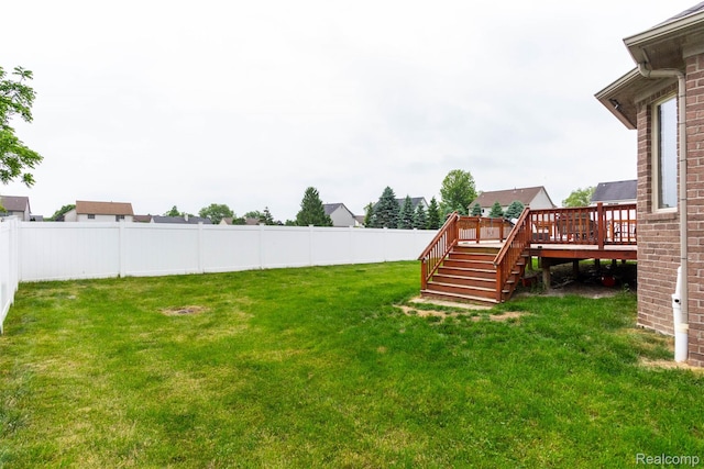52854 Schafers Run Ct, New Baltimore, MI 48051 - fenced backyard with a wooden deck and stairway