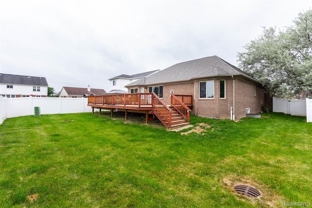 52854 Schafers Run Ct, New Baltimore, MI 48051 - back of property featuring a wooden deck, a fenced backyard, and brick siding