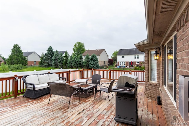 52854 Schafers Run Ct, New Baltimore, MI 48051 - wooden deck with an outdoor living space with a fire pit and a residential view