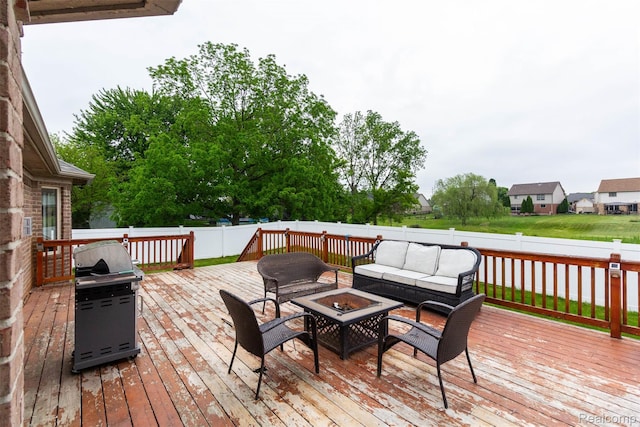 52854 Schafers Run Ct, New Baltimore, MI 48051 - deck with an outdoor living space with a fire pit, a grill, and a fenced backyard