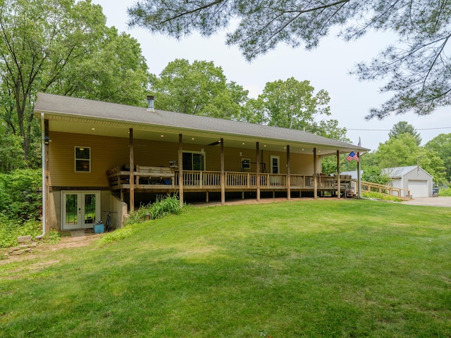 55840 Western Ave, Mattawan, MI 49071 - back of property with french doors, a yard, a detached garage, and a deck