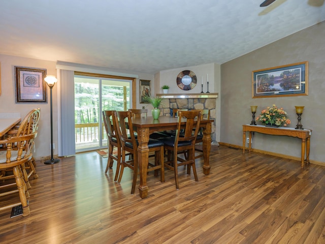 55840 Western Ave, Mattawan, MI 49071 - dining space with wood finished floors, ceiling fan, vaulted ceiling, and a textured ceiling