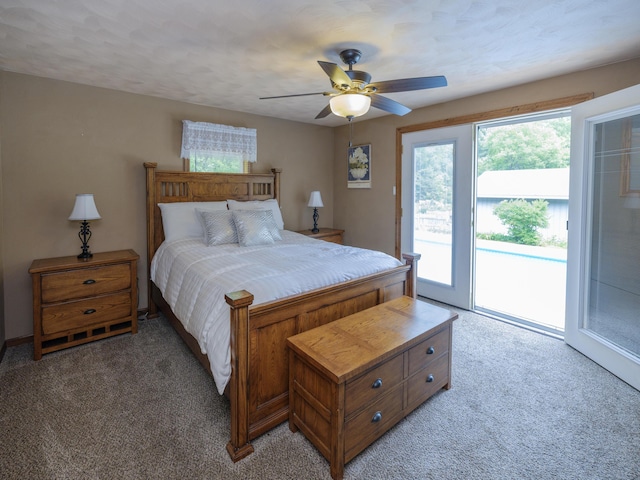 55840 Western Ave, Mattawan, MI 49071 - bedroom with access to exterior, light colored carpet, and ceiling fan