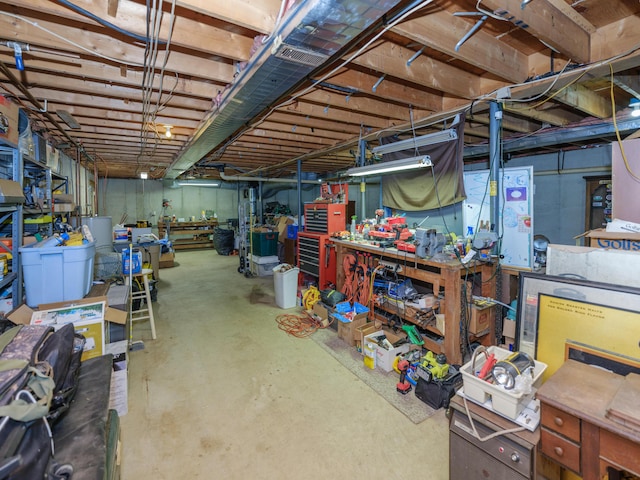 55840 Western Ave, Mattawan, MI 49071 - unfinished basement featuring a workshop area