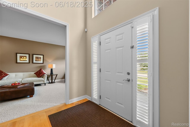 392 Gunston Ct, Troy, MI 48083 - foyer entrance with plenty of natural light and wood finished floors