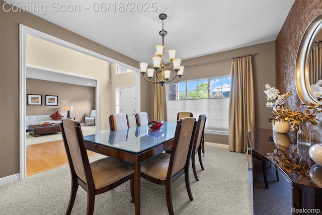 392 Gunston Ct, Troy, MI 48083 - dining space featuring light carpet and a chandelier