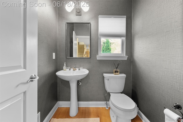 392 Gunston Ct, Troy, MI 48083 - bathroom featuring toilet and wood finished floors