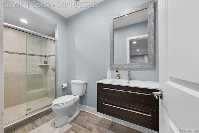392 Gunston Ct, Troy, MI 48083 - bathroom featuring vanity, a stall shower, and wood tiled floors