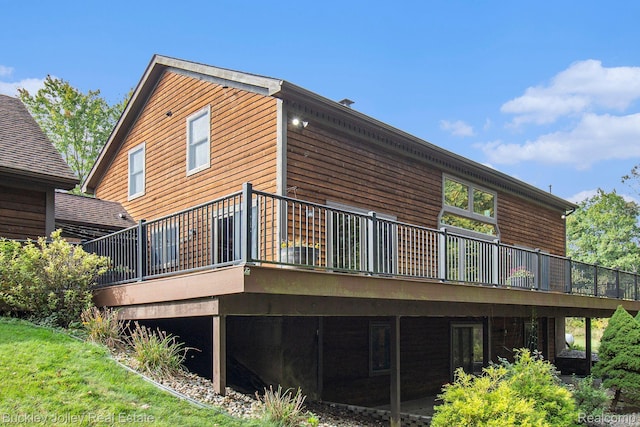 3278 Warner Rd, Howell, MI 48855 - back of house featuring a deck