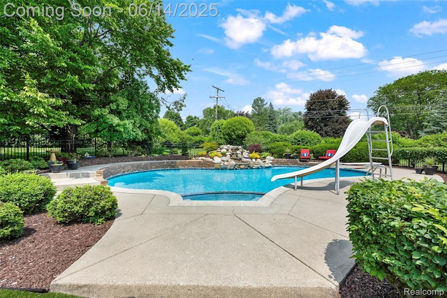 43115 Whisper Ct, Northville, MI 48168 - view of swimming pool with a water slide and a patio