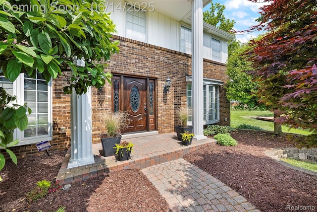 43115 Whisper Ct, Northville, MI 48168 - property entrance featuring brick siding