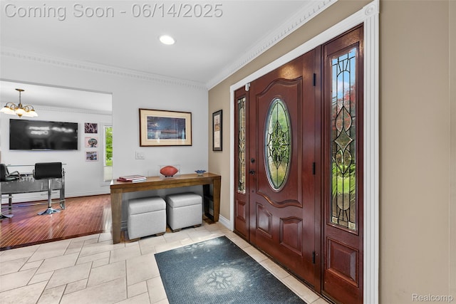 43115 Whisper Ct, Northville, MI 48168 - foyer featuring healthy amount of natural light, crown molding, a chandelier, and recessed lighting