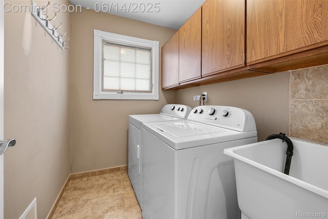 43115 Whisper Ct, Northville, MI 48168 - laundry area featuring washing machine and dryer and cabinet space