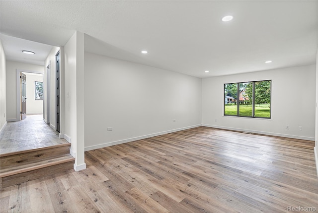 507 Charing Cross Dr, Grand Blanc, MI 48439 - spare room featuring plenty of natural light, light wood-style flooring, and recessed lighting