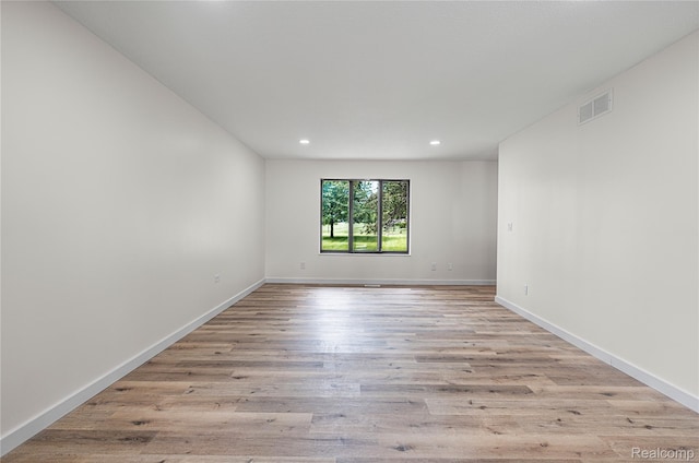 507 Charing Cross Dr, Grand Blanc, MI 48439 - empty room with recessed lighting and wood finished floors