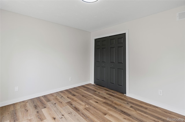 507 Charing Cross Dr, Grand Blanc, MI 48439 - unfurnished room with wood finished floors