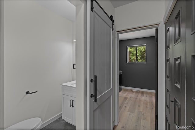507 Charing Cross Dr, Grand Blanc, MI 48439 - half bathroom with vanity and wood finished floors