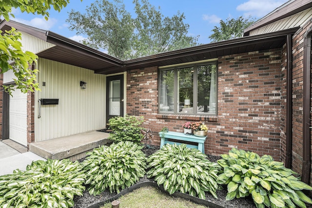 541 Maryland Ave NE Unit 39, Grand Rapids, MI 49503 - entrance to property featuring brick siding and a garage