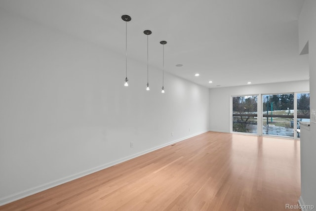 511 Brookside Ave, Birmingham, MI 48009 - empty room with light wood-style flooring and recessed lighting