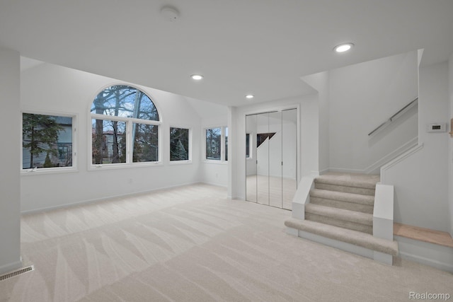 511 Brookside Ave, Birmingham, MI 48009 - unfurnished living room featuring carpet, recessed lighting, and stairs