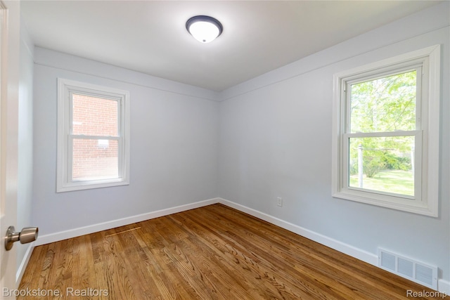 24251 Cloverlawn St, Oak Park, MI 48237 - empty room featuring wood finished floors and baseboards