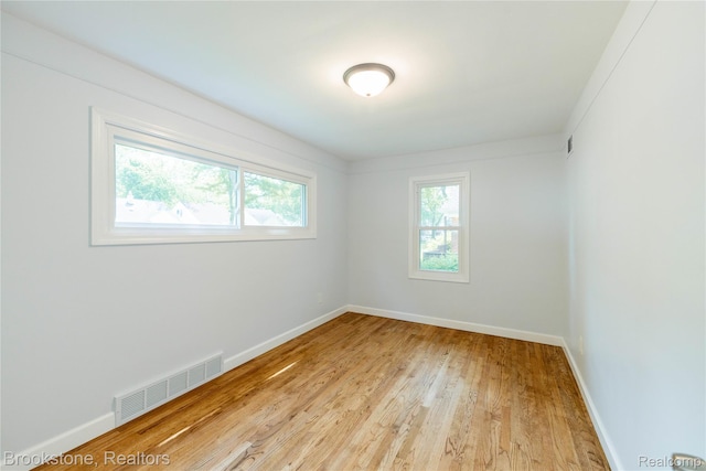 24251 Cloverlawn St, Oak Park, MI 48237 - unfurnished room with wood finished floors and baseboards