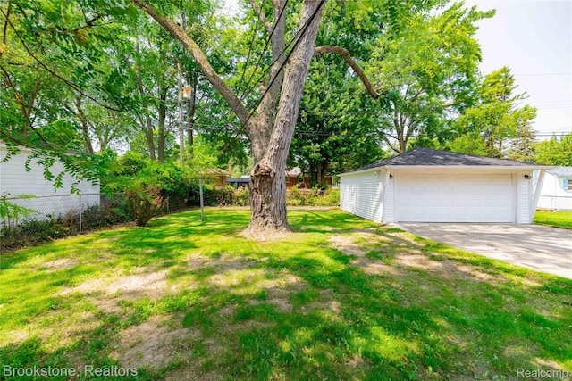 24251 Cloverlawn St, Oak Park, MI 48237 - view of yard with an outdoor structure and a garage