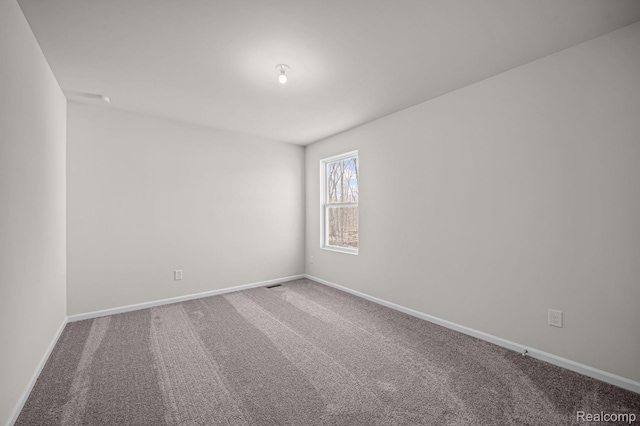 4278 Oak St, Grand Blanc, MI 48439 - carpeted spare room featuring baseboards