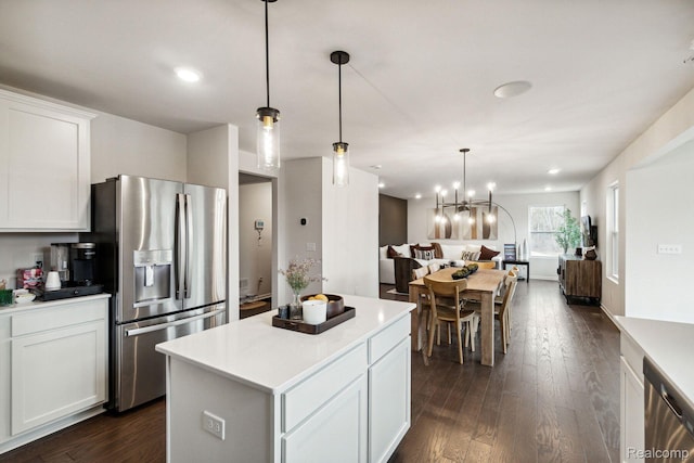 4278 Oak St, Grand Blanc, MI 48439 - kitchen with stainless steel appliances, a kitchen island, open floor plan, dark wood-style floors, and recessed lighting