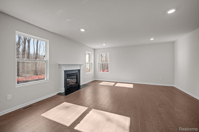 4278 Oak St, Grand Blanc, MI 48439 - unfurnished living room featuring wood finished floors, recessed lighting, and a high end fireplace